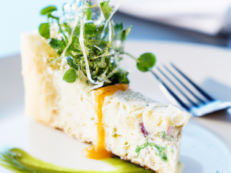 Cheesecake with Dried Cranberries, Microgreens, and Orange Caramel Sauce