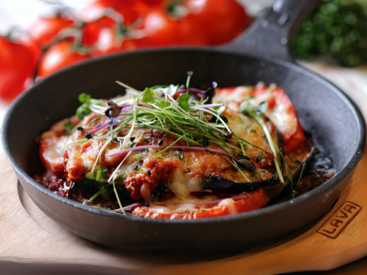Hearty Eggplant Parmesan Stacks with Tomato and Microgreens